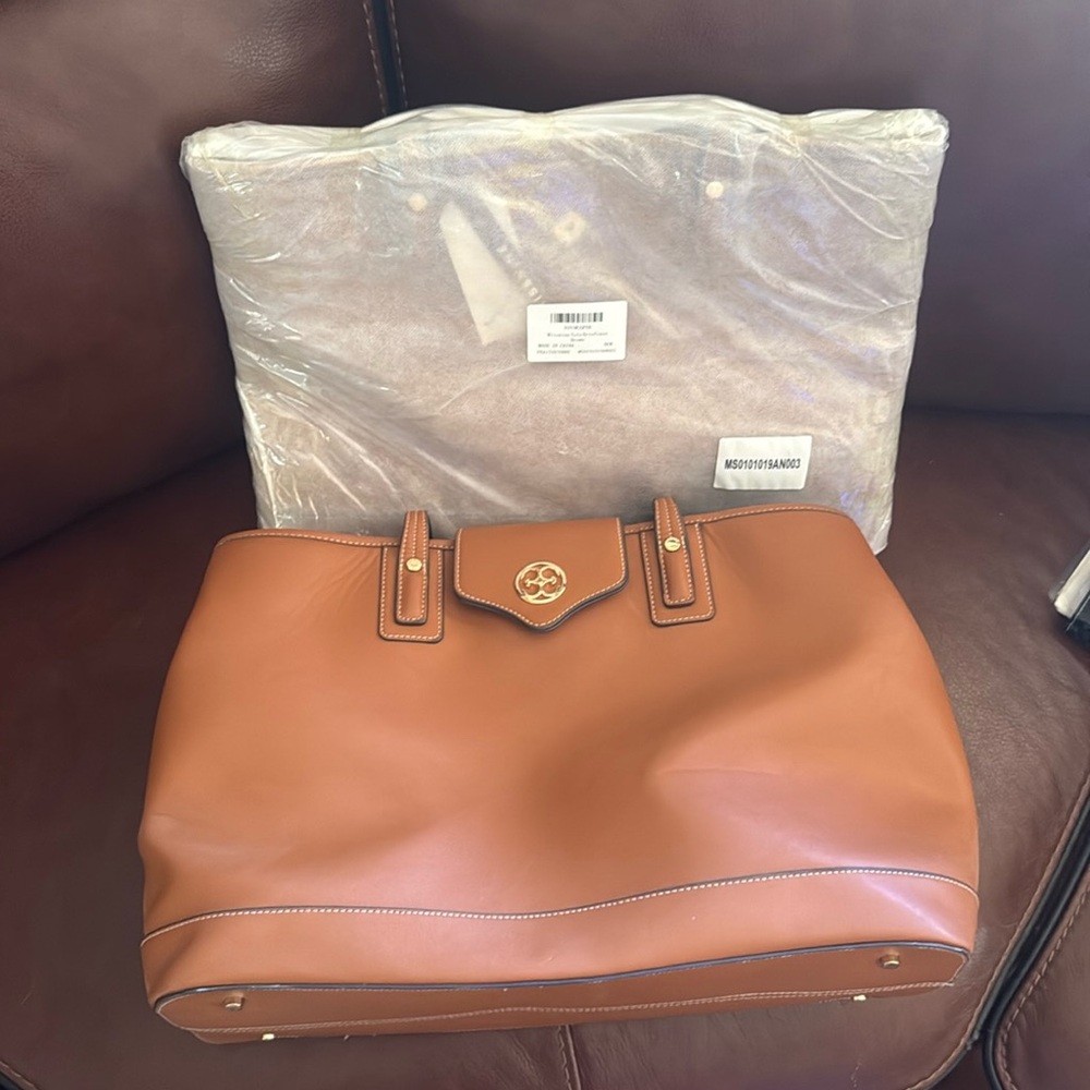 2 matching cognac tote business bags. 1 new in packing 1 used